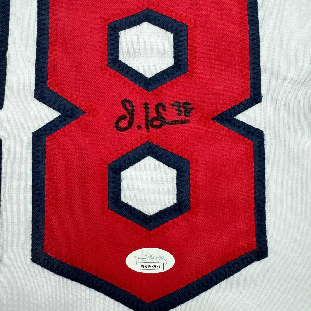 Red and white custom jersey with number 8 and autograph from professional sports league