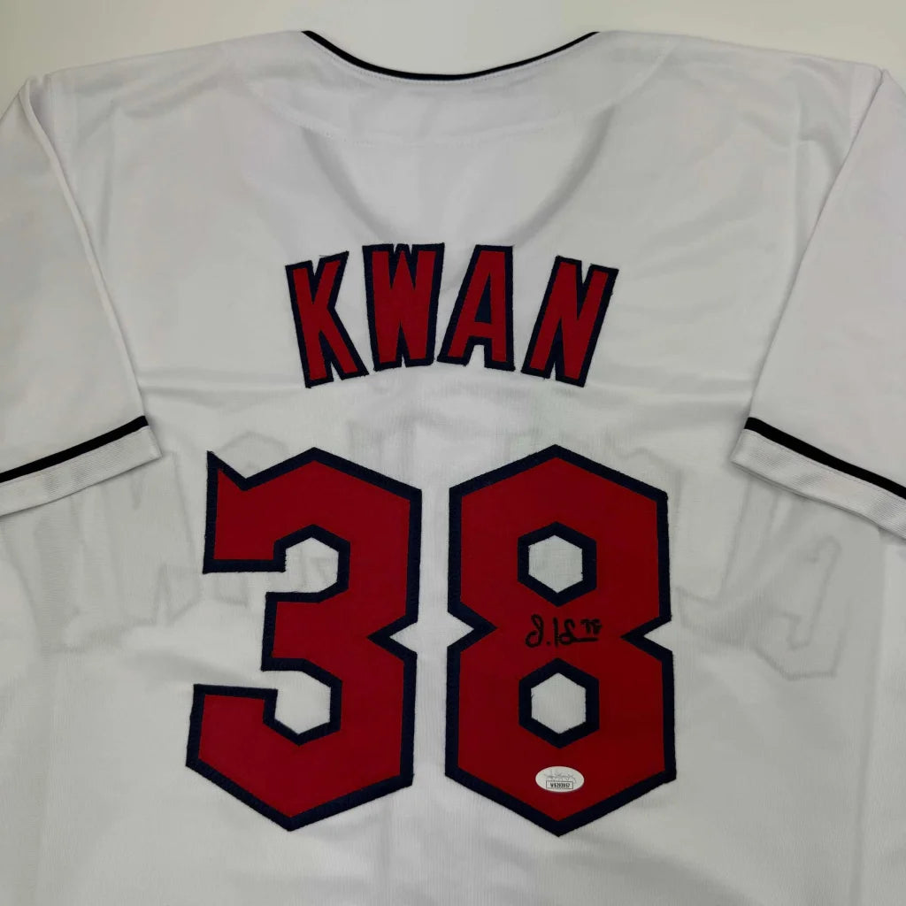 White custom jersey from professional sports league with signature and authentication sticker