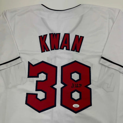 White custom jersey from professional sports league with signature and authentication sticker