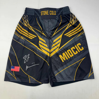 Autographed Stipe Miocic Black and Gold UFC MMA Trunks Shorts Ultimate Fighting Beckett BAS COA | Hall of Fame Sports Memorabilia | vintageantiquesgifts.com