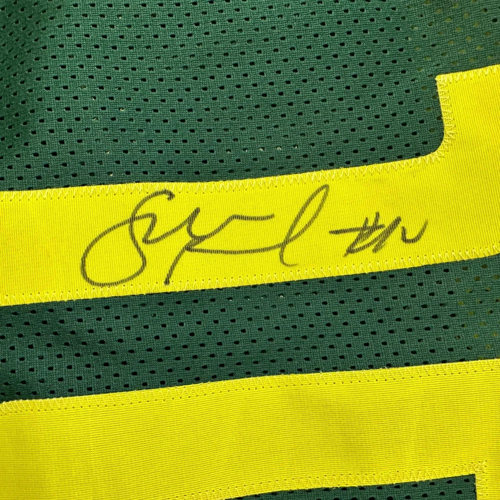 Green mesh fabric with yellow stripes and autograph on custom jersey for professional sports