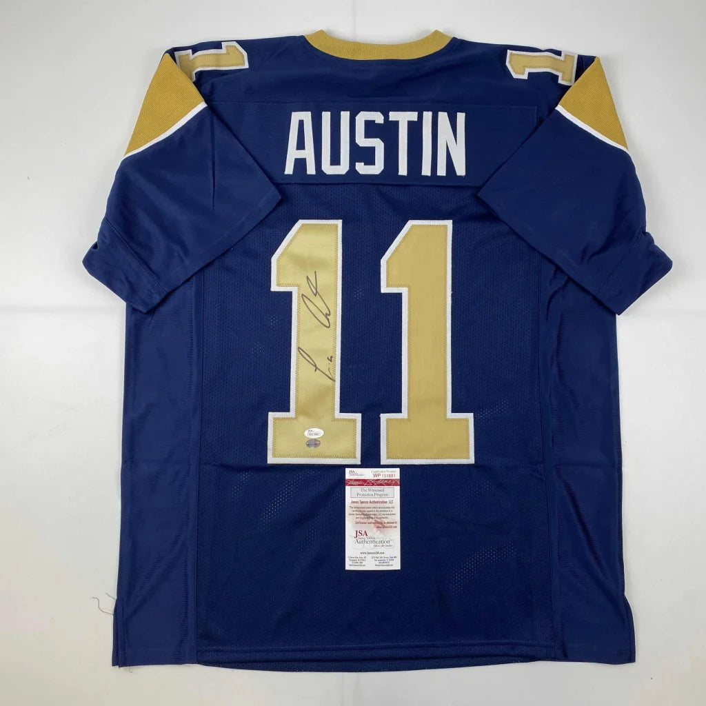 Blue and gold professional sports jersey with signature from Austin 11, perfect for sports league fans