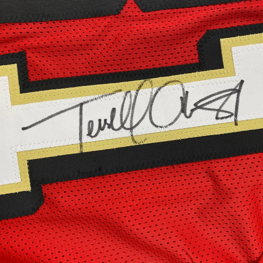 Autographed red custom jersey from Terrell Owens #81, a pro sports league collectible
