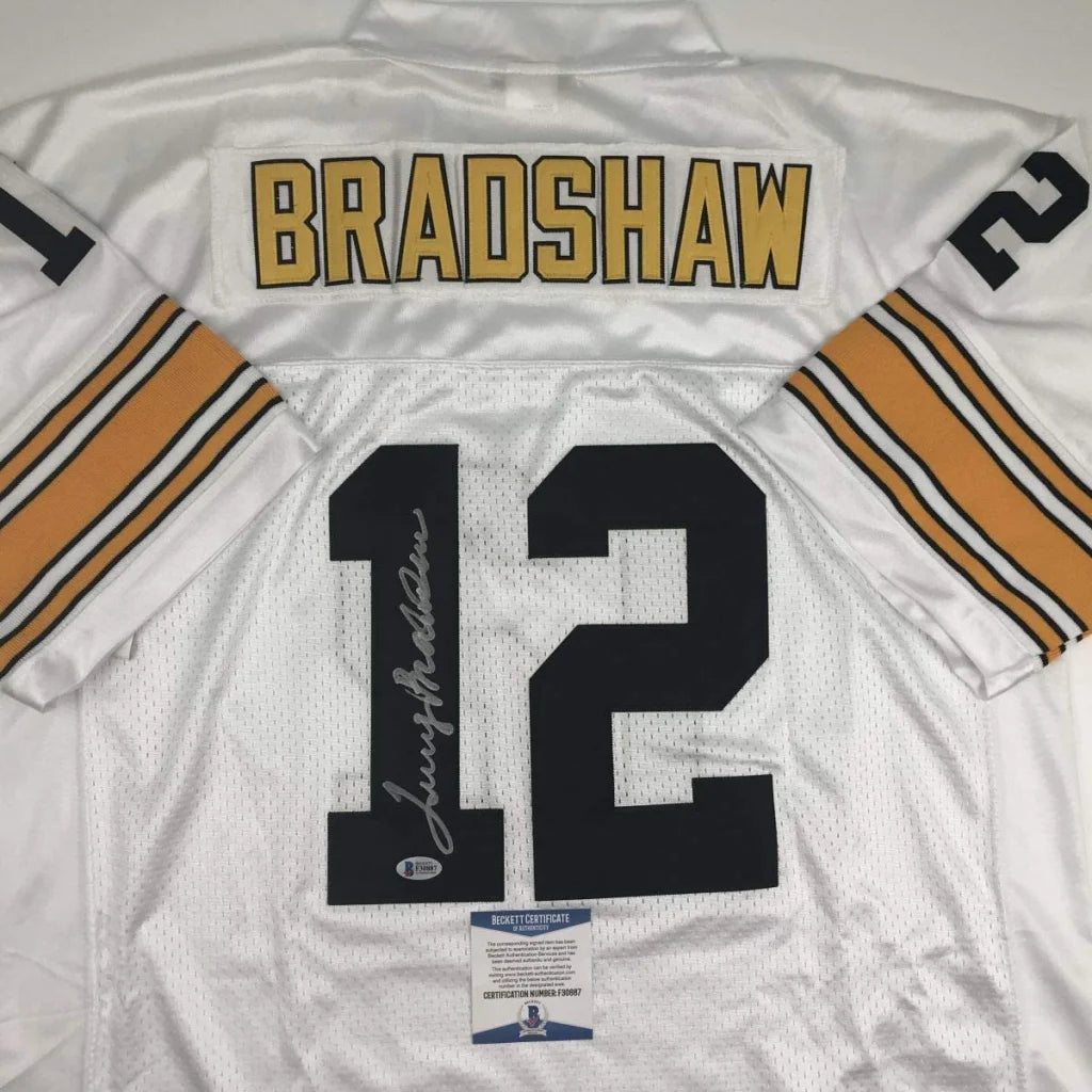 Back view of white custom football jersey with gold and black lettering bradshaw 12 signed for professional sports league fans