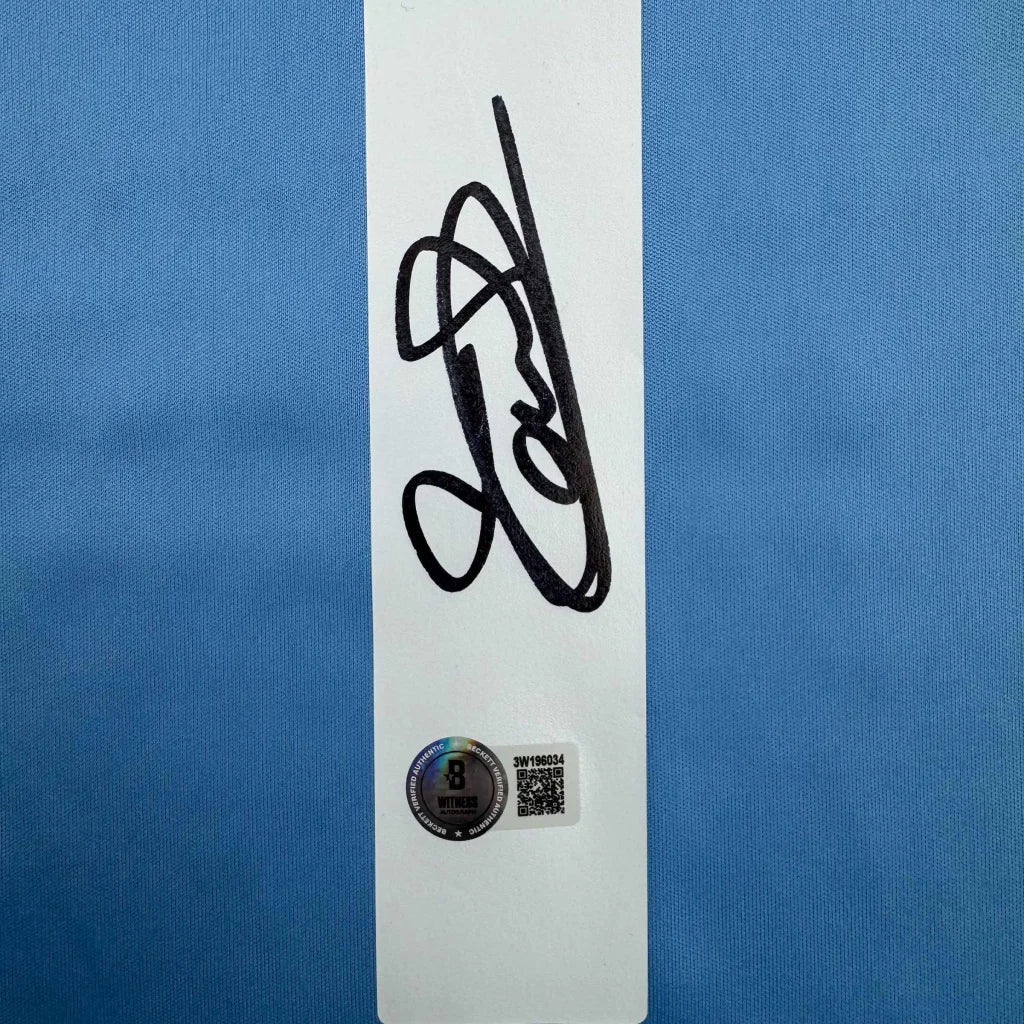 Autographed Thibaut Courtois Real Madrid blue jersey with black ink signature, Beckett BAS COA card and QR code
