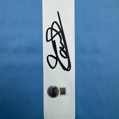 Autographed Thibaut Courtois Real Madrid blue jersey with black ink signature, Beckett BAS COA card and QR code