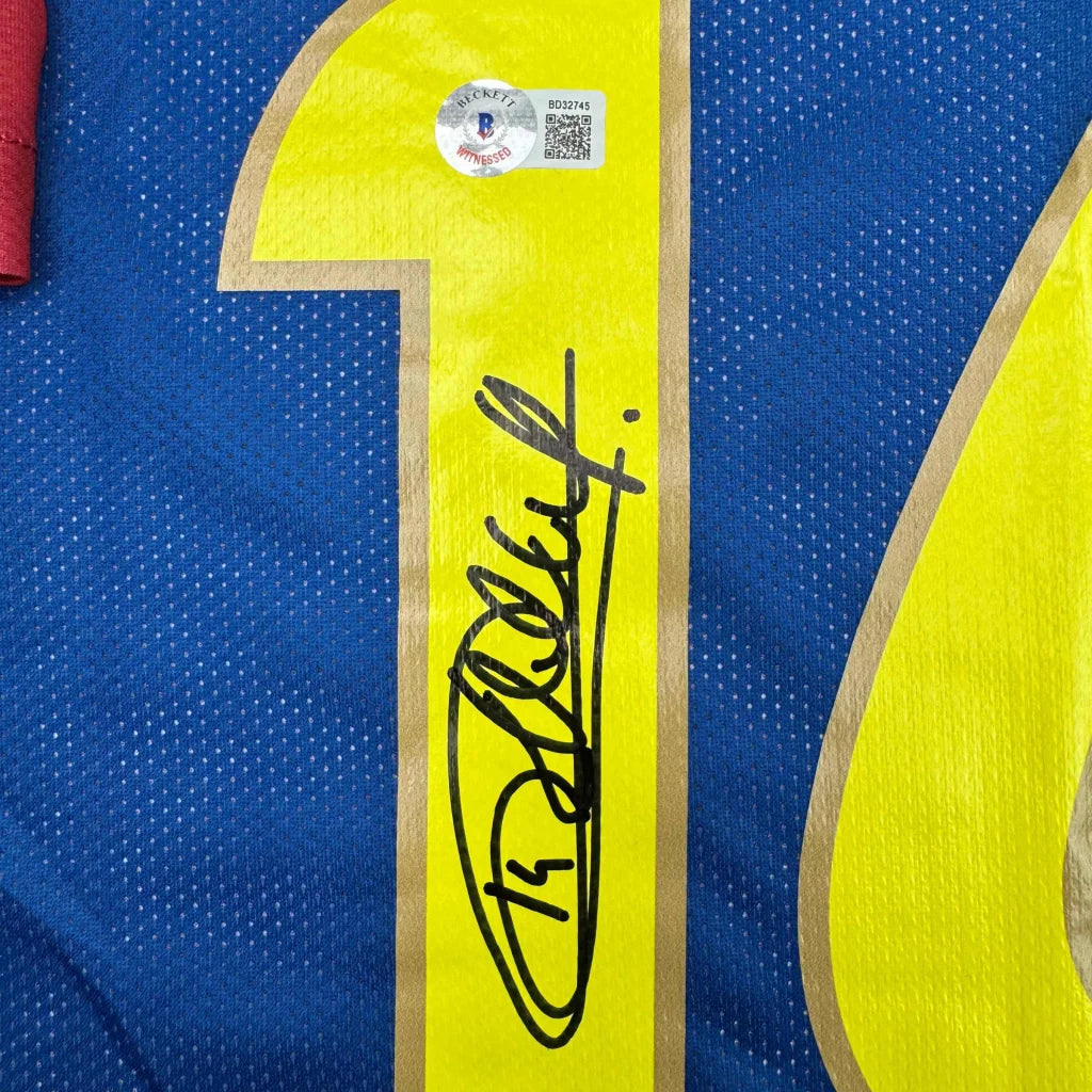 Blue custom jersey with yellow 10, signature, and authentication sticker for professional sports fans