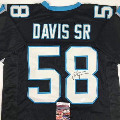 Black carolina panthers custom jersey in black with light blue and white lettering featuring davis sr 58 on back