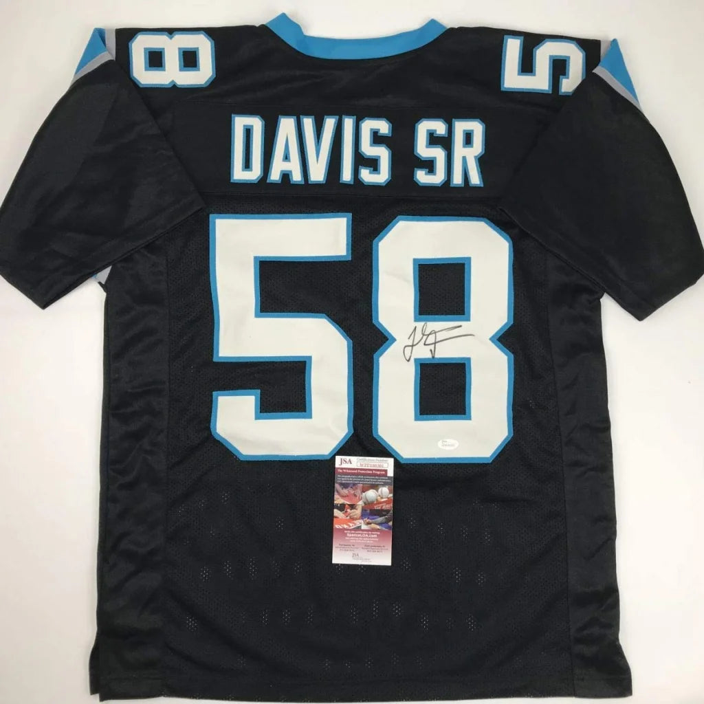 Back side of autographed black Carolina Panthers custom jersey with white light blue lettering number 58 Davis Sr for professional sports league fans