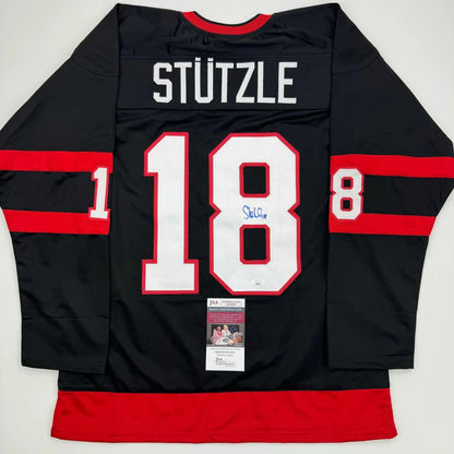 Autographed Tim Stutzle Ottawa Black Hockey Jersey JSA COA | Hall of Fame Sports Memorabilia | vintageantiquesgifts.com