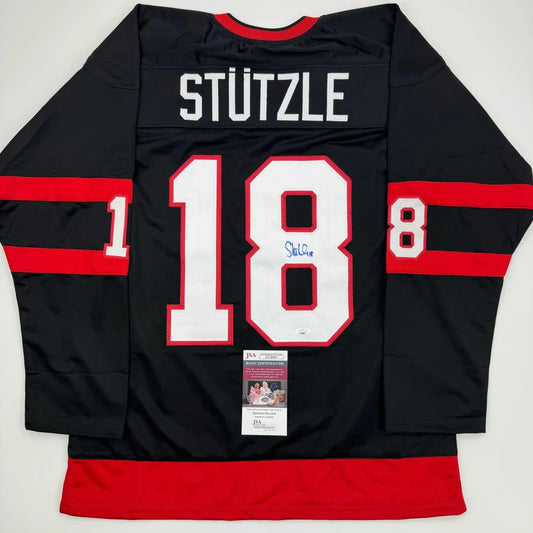 Autographed Tim Stutzle Ottawa Black Hockey Jersey JSA COA | Hall of Fame Sports Memorabilia | vintageantiquesgifts.com