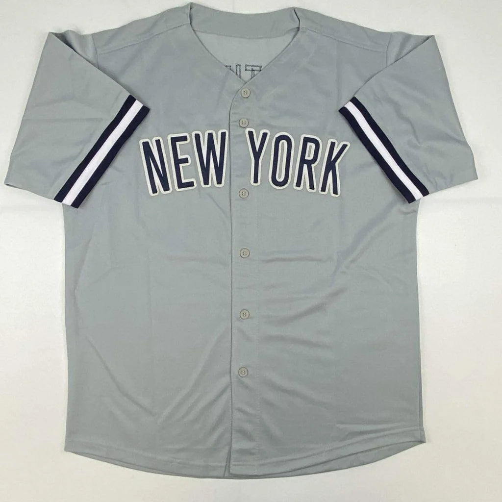 Gray New York Yankees custom jersey with navy and white striped sleeves for professional sports fans