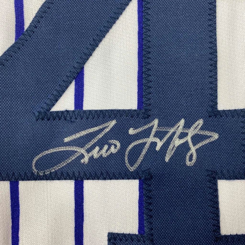Autographed blue and white striped custom jersey from Professional Sports League