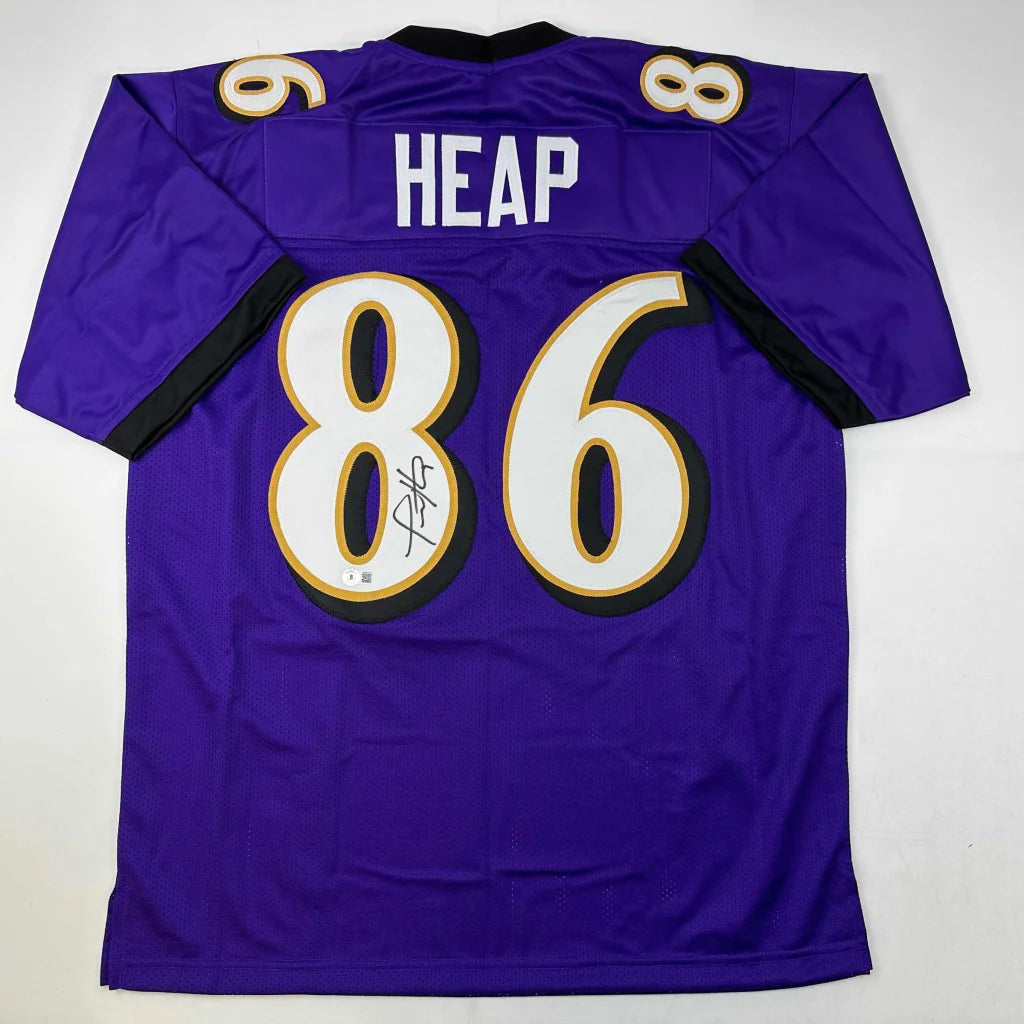 Back of autographed purple baltimore ravens custom football jersey with white gold number 86 and name heap from professional sports league