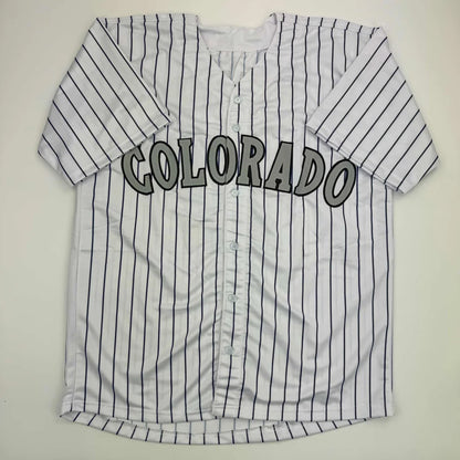 White Todd Helton HOF custom jersey with black pinstripes and Colorado lettering