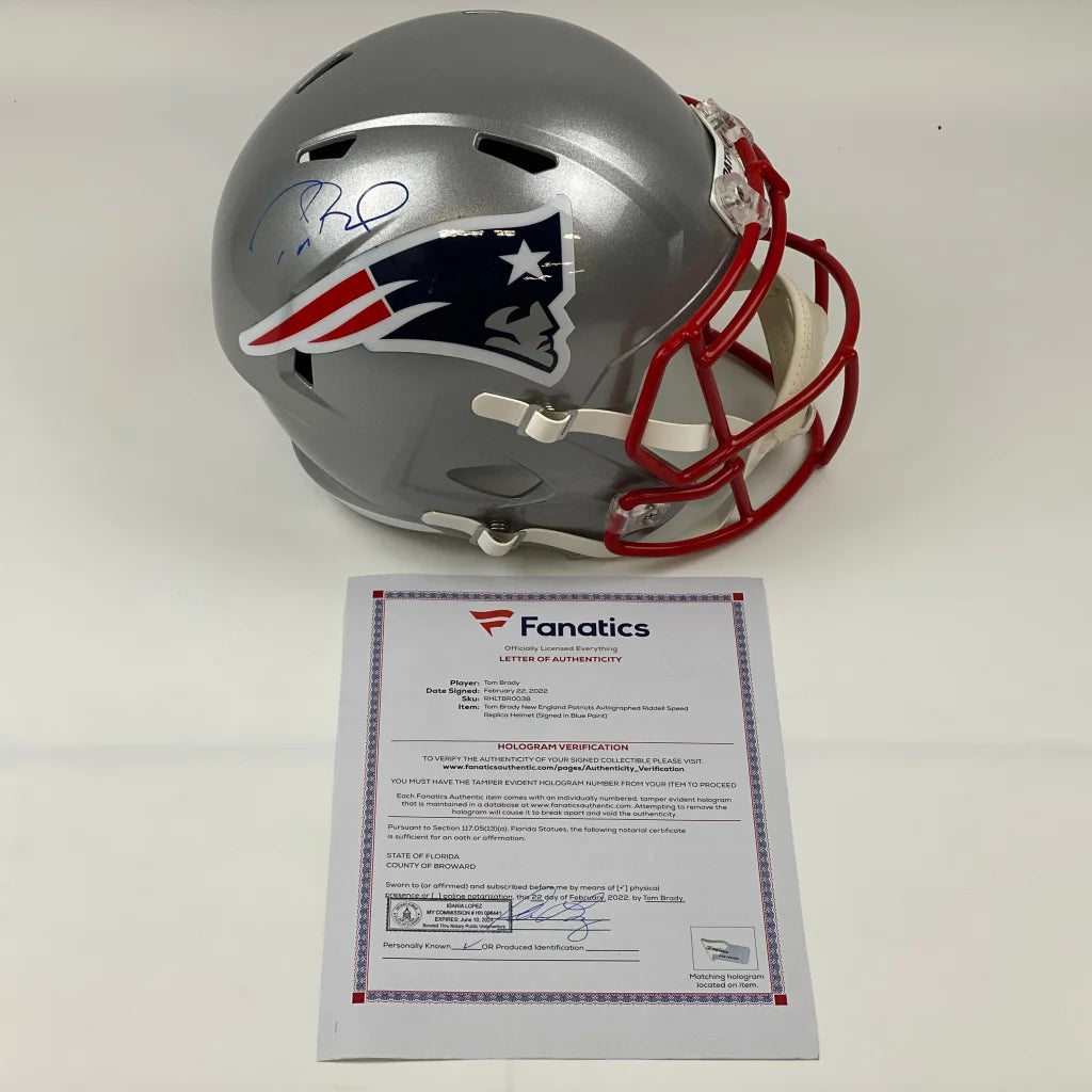 Autographed Tom Brady silver New England Patriots helmet with red faceguard