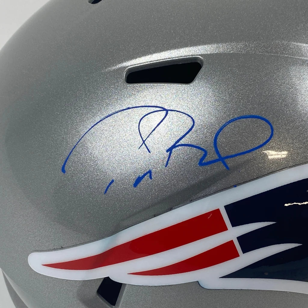 Silver New England Patriots mini helmet with blue autograph and third party authentication