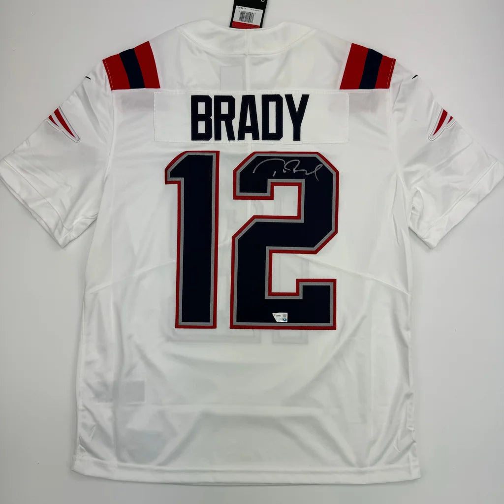 White New England Patriots Tom Brady jersey with official autograph product shot