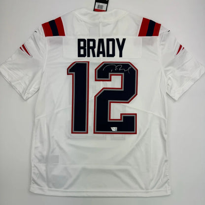 White New England Patriots Tom Brady jersey with official autograph product shot