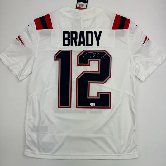White New England Patriots Tom Brady jersey with official autograph product shot