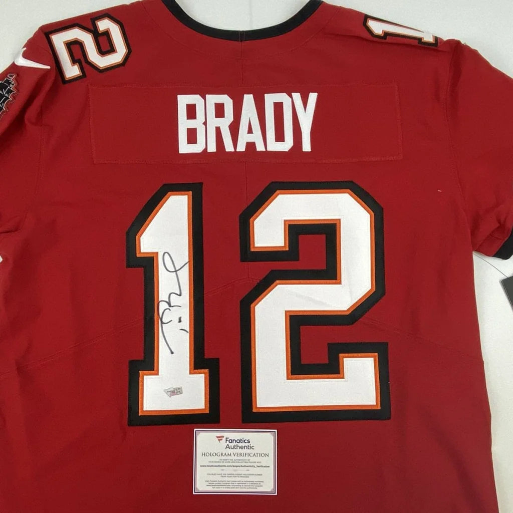 Red Tom Brady Buccaneers jersey with autograph and third party authentication for fans