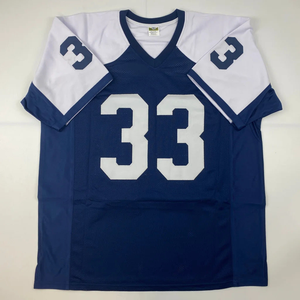 Autographed Tony Dorsett custom Dallas jersey in navy blue and white, number 33, JSA COA
