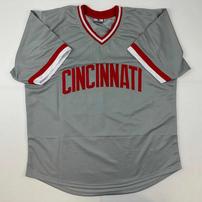 Gray short-sleeved V-neck jersey with red and white trim for professional sports league fans