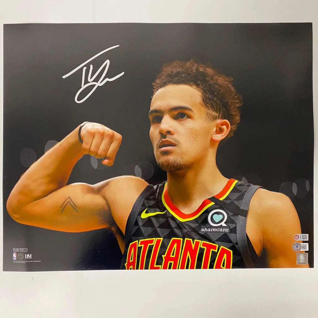 Autographed Trae Young Atlanta Hawks 16x20 photo in black yellow jersey