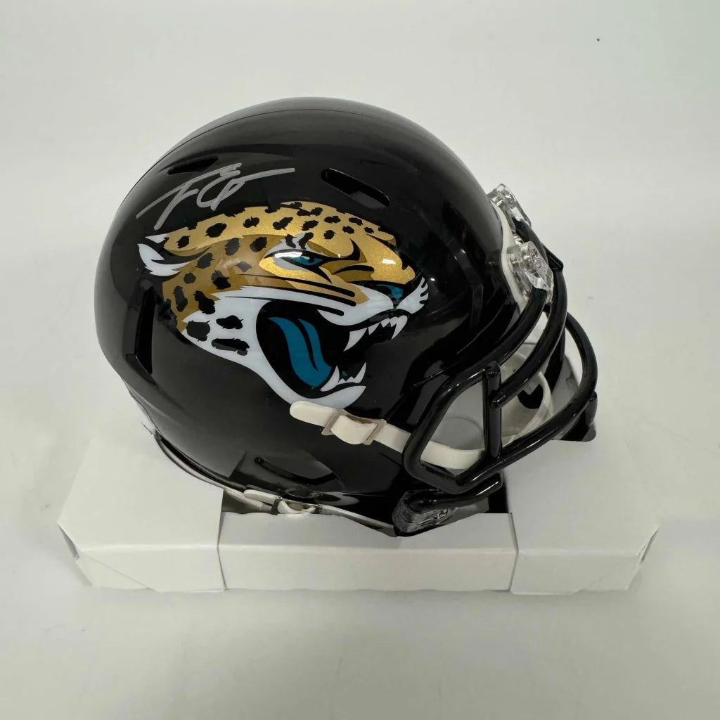 Black Jacksonville Jaguars signed mini helmet with third party authentication for fans