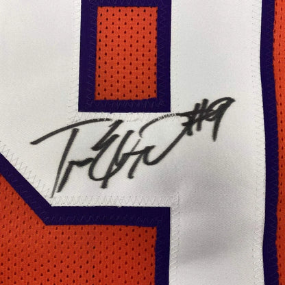 Autographed orange and purple custom jersey from ETIENNE JR, a pro sports collectible