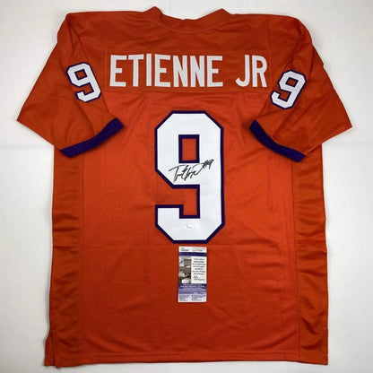 Autographed orange custom jersey with ETIENNE JR and number 9 for sports league fans