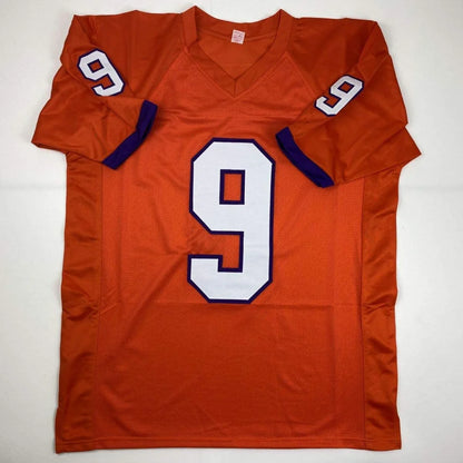Orange custom jersey with white number 9 from ETIENNE JR professional sports collectibles