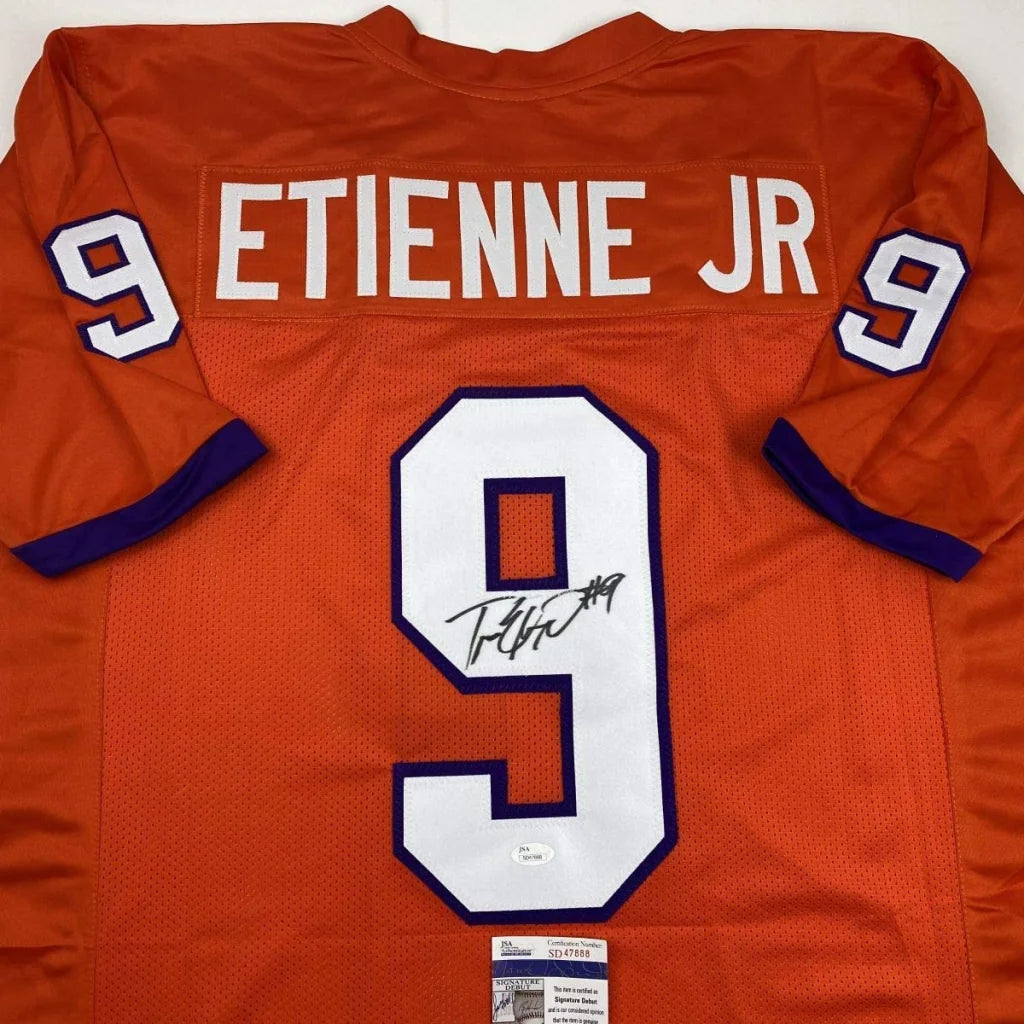Autographed orange custom jersey with ETIENNE JR and 9 for sports league fans
