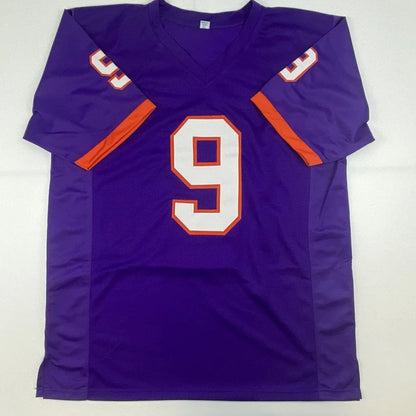 Autographed Travis Etienne Jr. Clemson purple custom jersey with white orange numerals