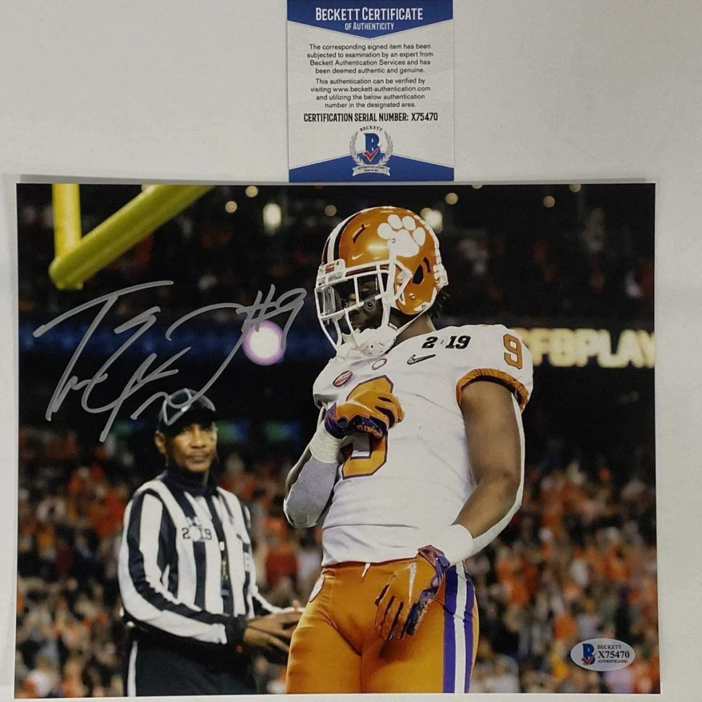 Autographed Travis Etienne Clemson Tigers photo certified by Beckett BAS