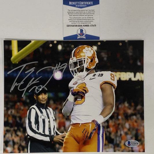 Autographed Travis Etienne Clemson Tigers photo certified by Beckett BAS