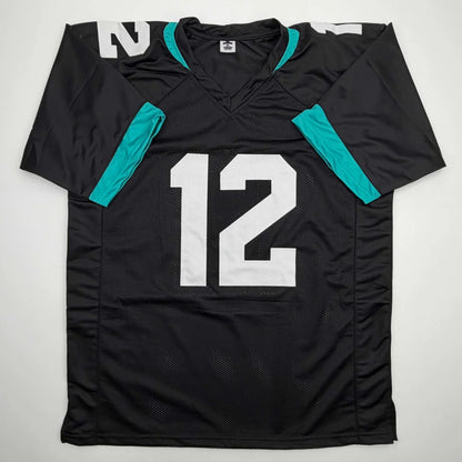 Autographed Travis Hunter Jacksonville Black Football Jersey Beckett BAS COA | Authenticated Signed Sports Jersey | vintageantiquesgifts.com