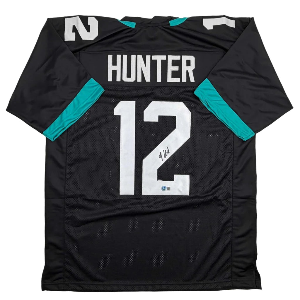 Autographed Travis Hunter Jacksonville Black Football Jersey Beckett BAS COA | Hall of Fame Sports Memorabilia | vintageantiquesgifts.com