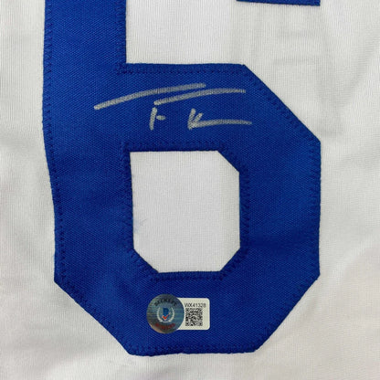 White custom jersey with blue 6 and autograph for professional sports league fans