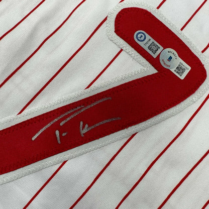 White pinstripe custom jersey with red trim and silver autograph for sports league fans