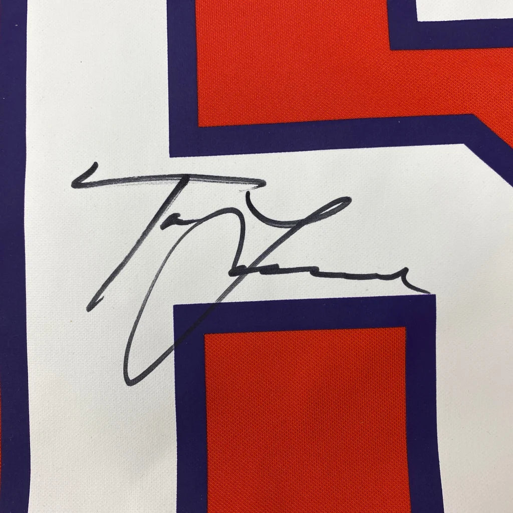 Autographed Trevor Lawrence Clemson Tigers Nike jersey with black ink signature on white fabric with red and navy blue geometric patterns