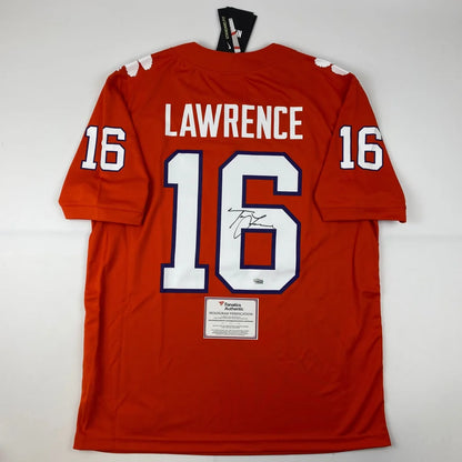 Red NFL jersey with white numbers signed by player, third party authentication guaranteed