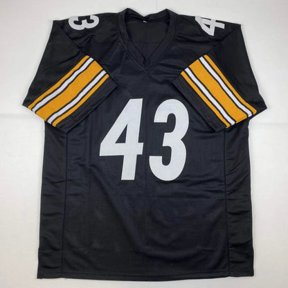 Black custom jersey with 43 and yellow white striped sleeves from professional sports league