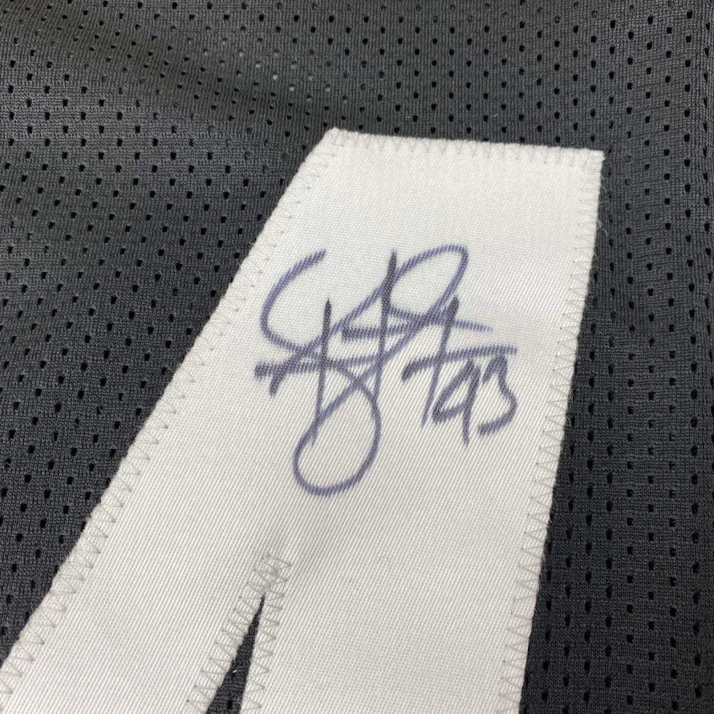 Autographed white fabric tag on gray mesh jersey for custom jersey in professional sports league