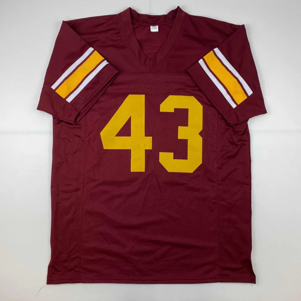 Maroon custom jersey with 43 in yellow and striped sleeves, no professional sports league branding
