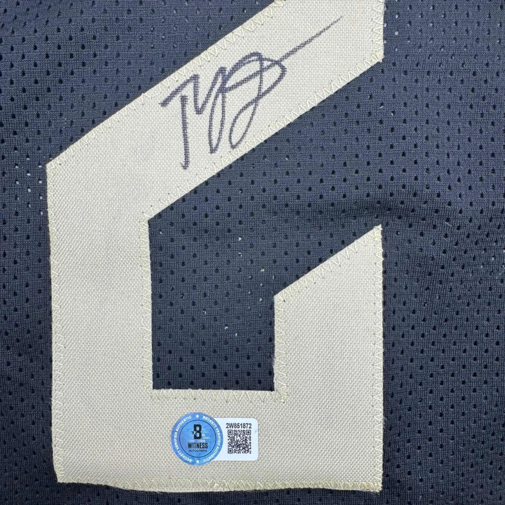 Autographed Jerome Cleveland Black Basketball Jersey with authentication sticker