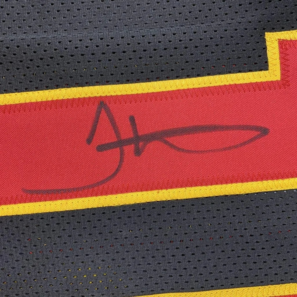 Autographed red and black kansas city football custom jersey with yellow trim and signature for professional sports league fans