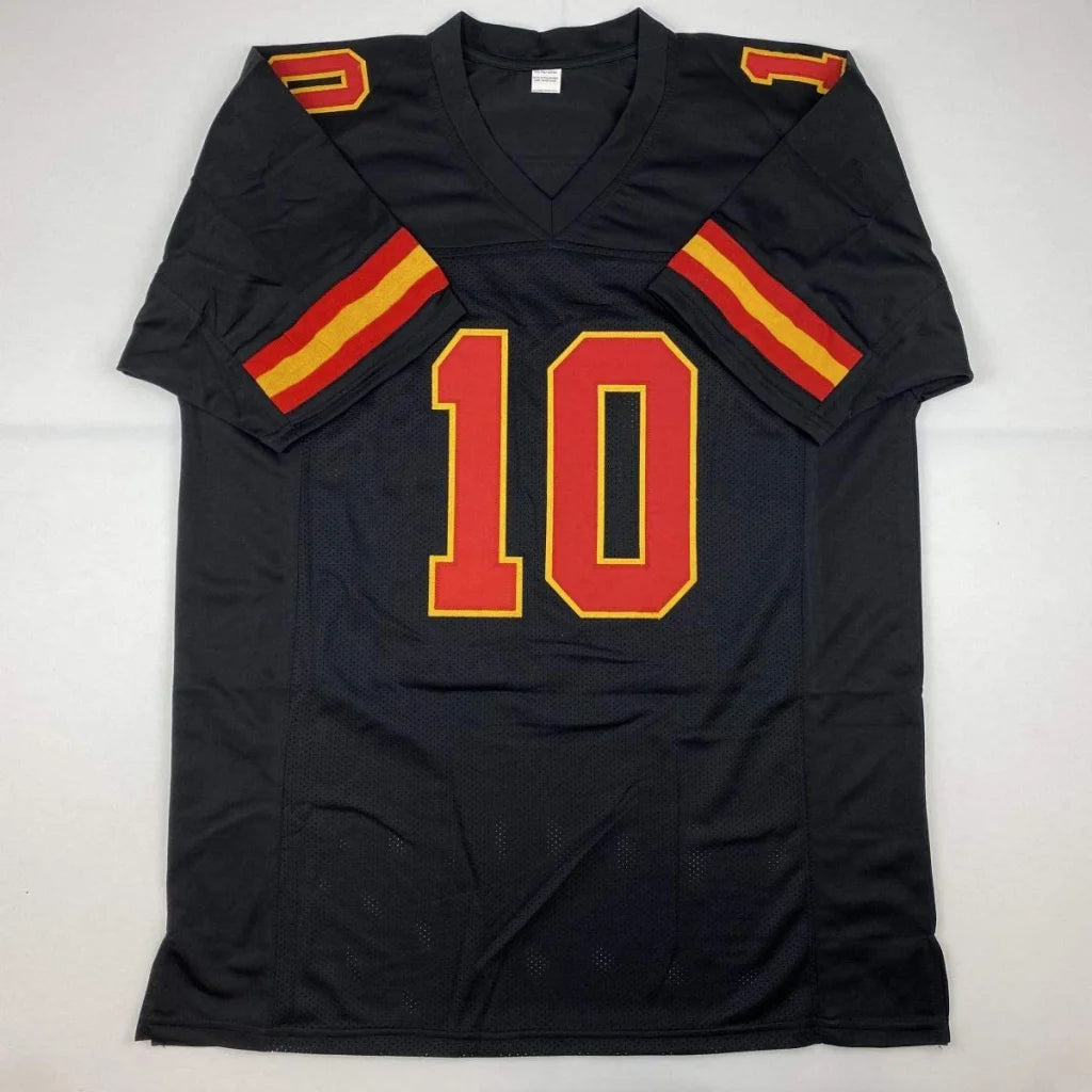 Autographed Tyreek Hill custom black football jersey with red yellow number 10 and sleeve stripes from professional sports league