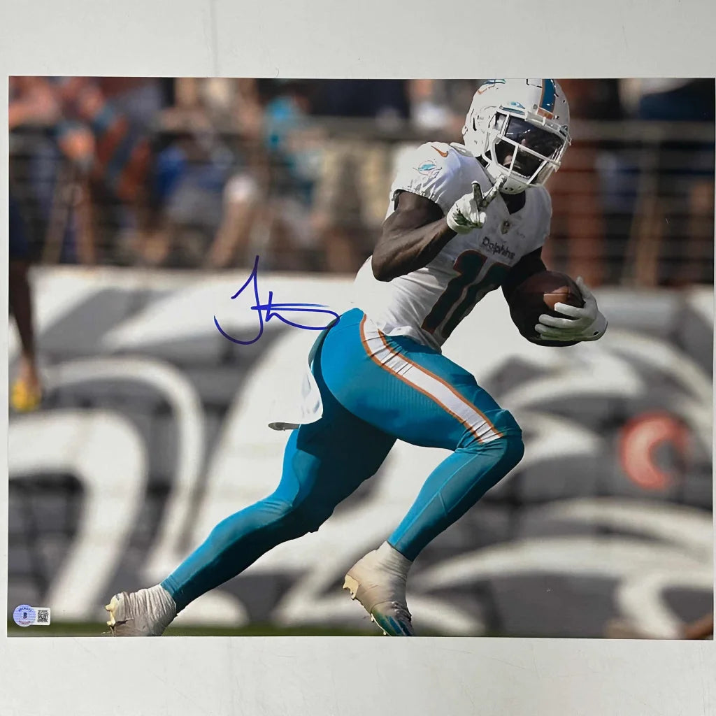 Autographed Tyreek Hill Miami Dolphins 16x20 Football Photo Beckett BAS COA | Hall of Fame Sports Memorabilia | vintageantiquesgifts.com