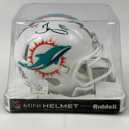 Autographed Miami Dolphins mini helmet in display case for the Authenticated Miami Dolphins Mini Helmet with Player Autograph product